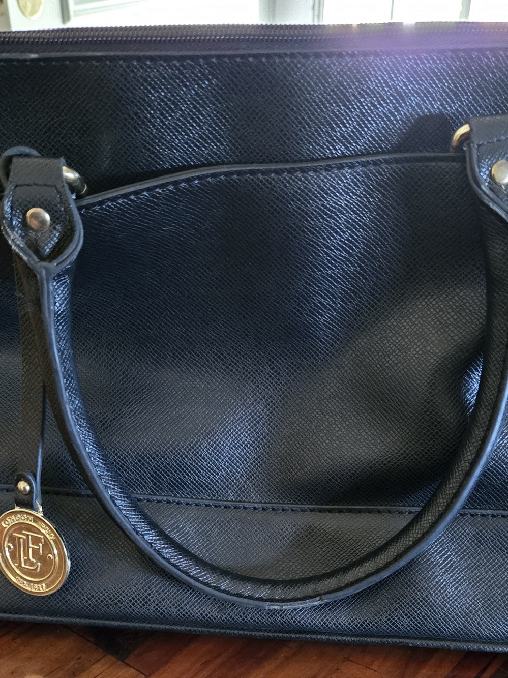 London Fog Black Saffiano Satchel with Gold Medallion